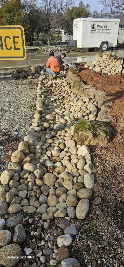 Proper drainage setup for river rock, Weiss Landscaping, Nevada County Landscape Contractors.